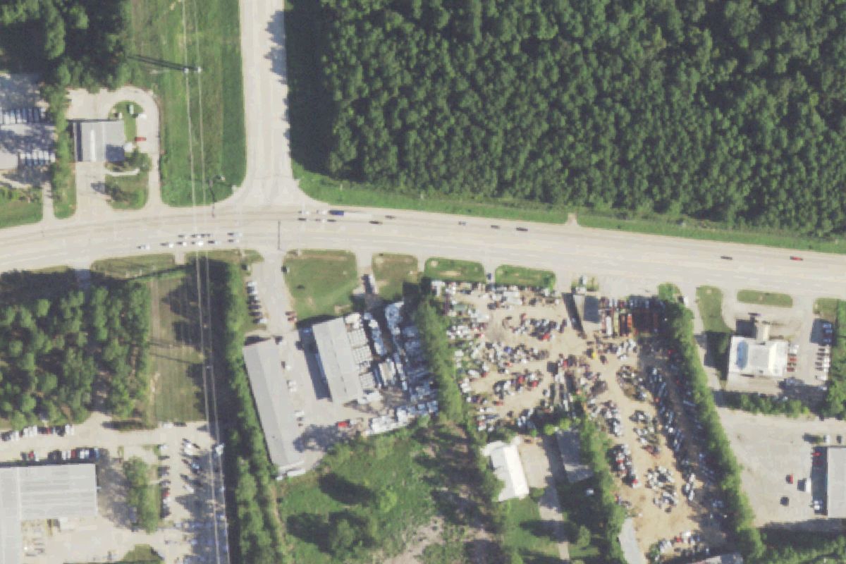 Aerial photo of McCulloch Auto Salvage at 606 N Loop 336 E