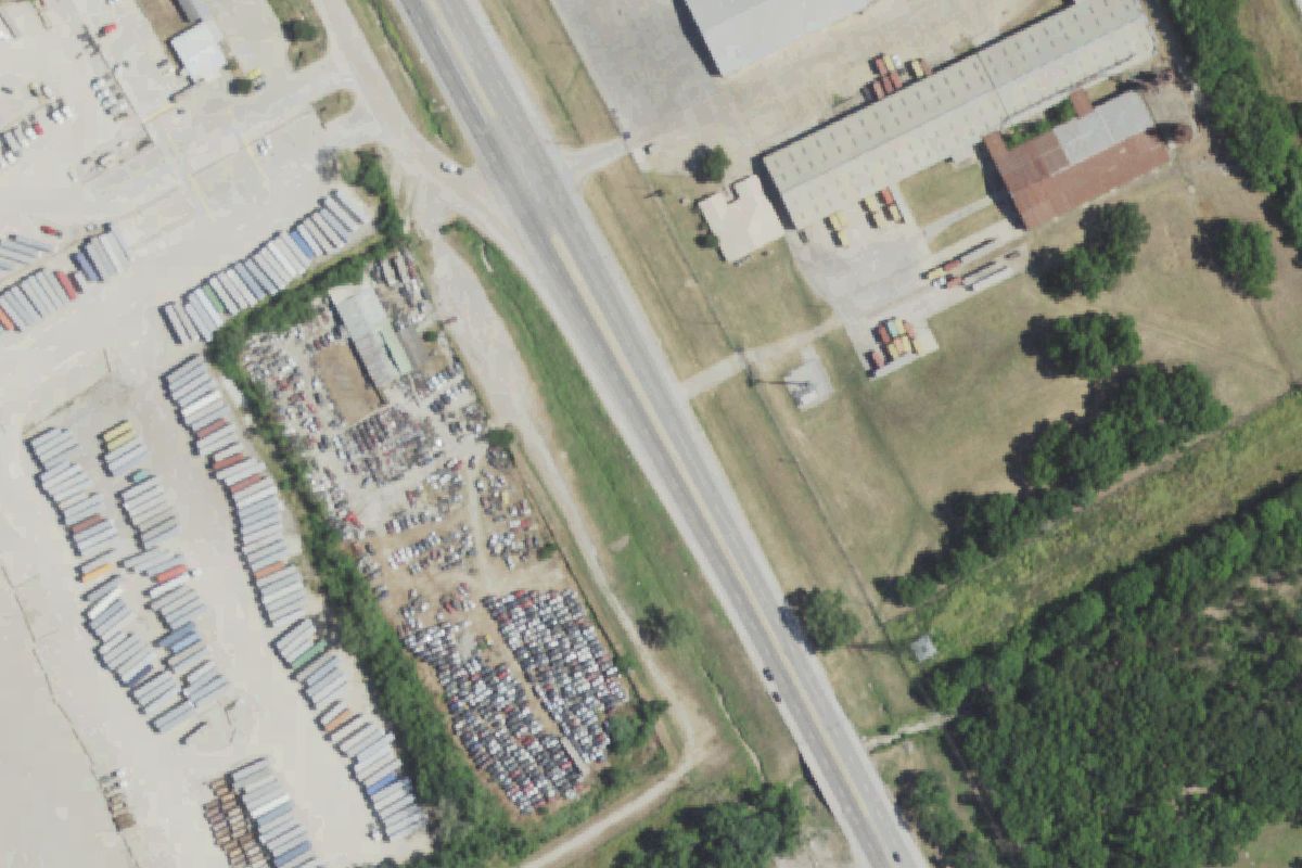 Aerial photo of Bill Jones Auto Parts & Perez Used Cars at 8601 S Central Expy