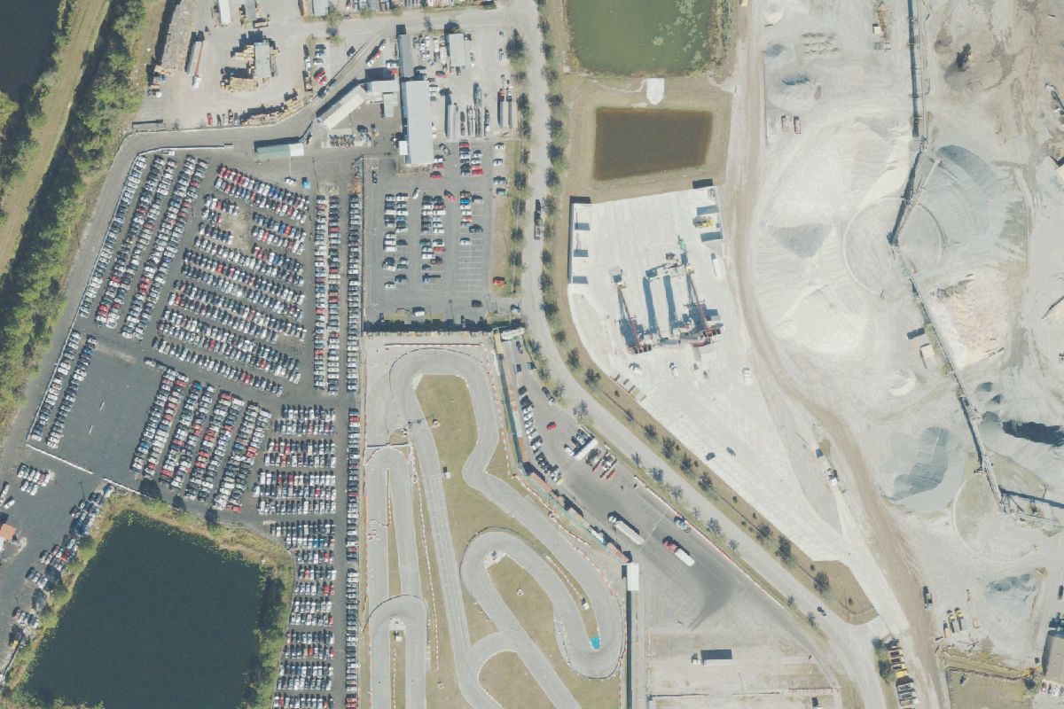 Aerial photo of Central Florida Pull & Pay at 10694 Cosmonault Blvd