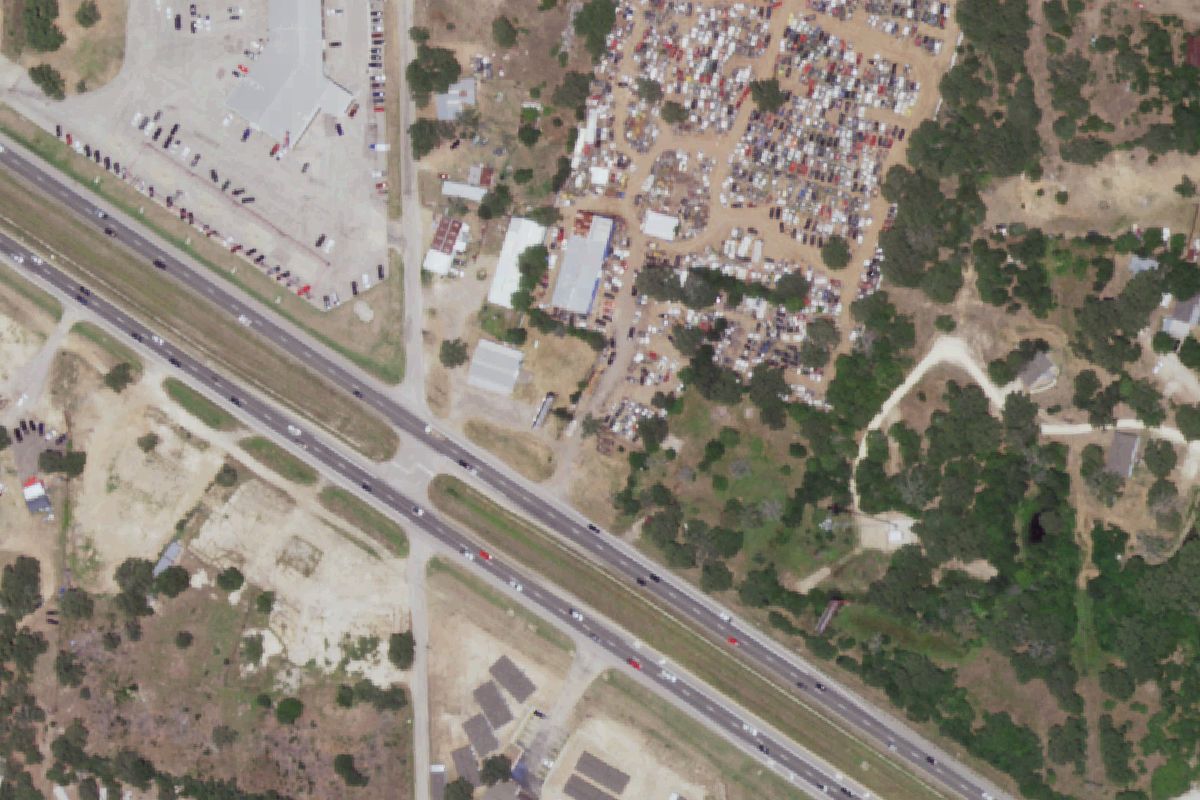 Aerial photo of Fidels Auto Salvage at 1552 Tx-71 W