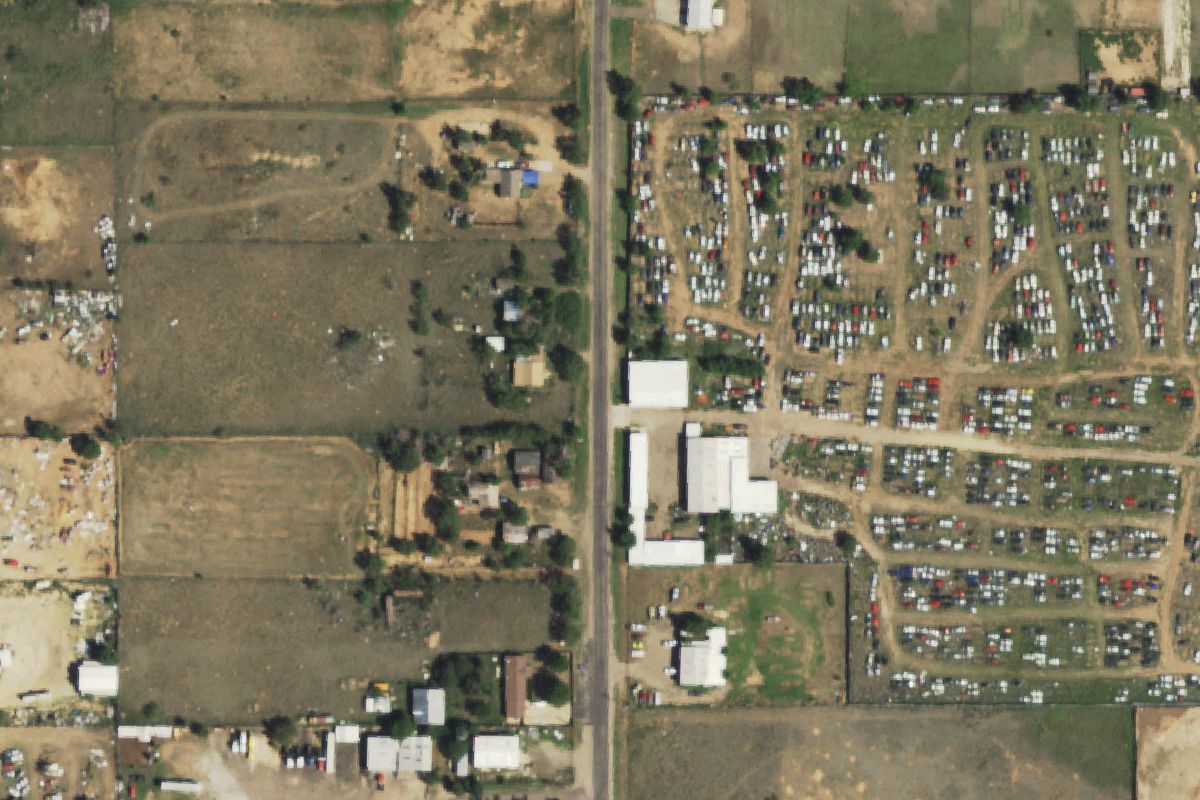 Aerial photo of Le's Used Auto Parts & Used Cars at 4600 Glenn St