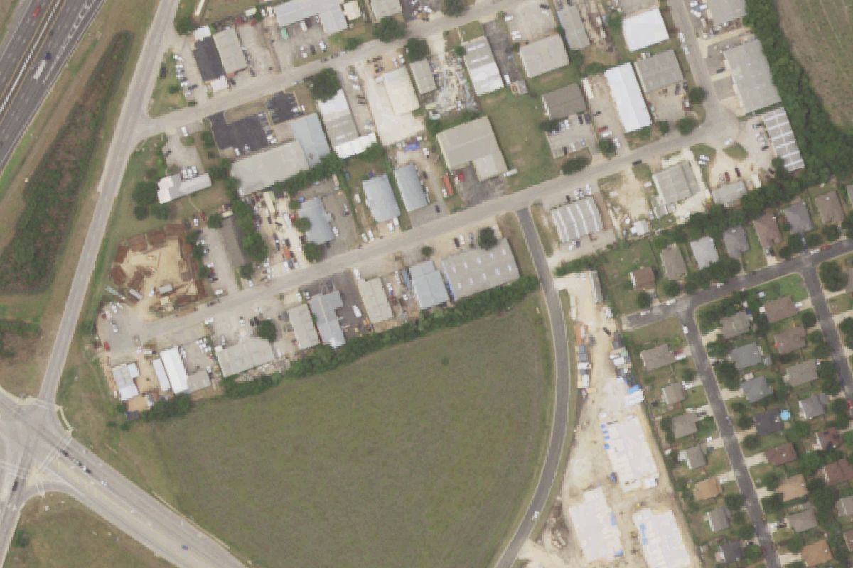 Aerial photo of Texas International Tires Truck Parts & Chrome at 40114 Industrial Park Circle