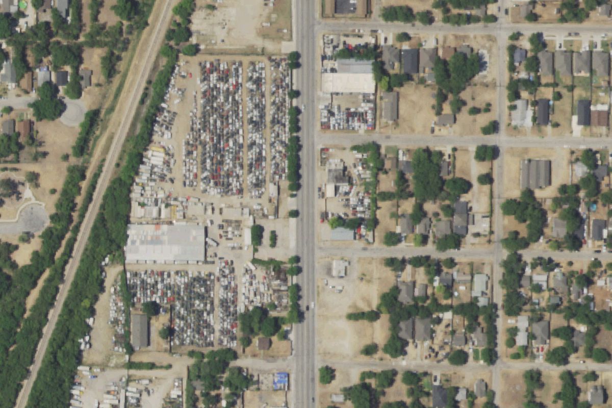 Aerial photo of Action Auto Recycling at 2212 S Riverside Dr