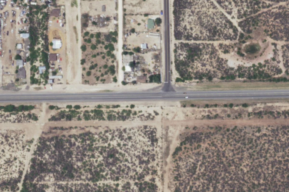 Aerial photo of Amigos Used Parts Junk Yard at 9428 State Highway 359