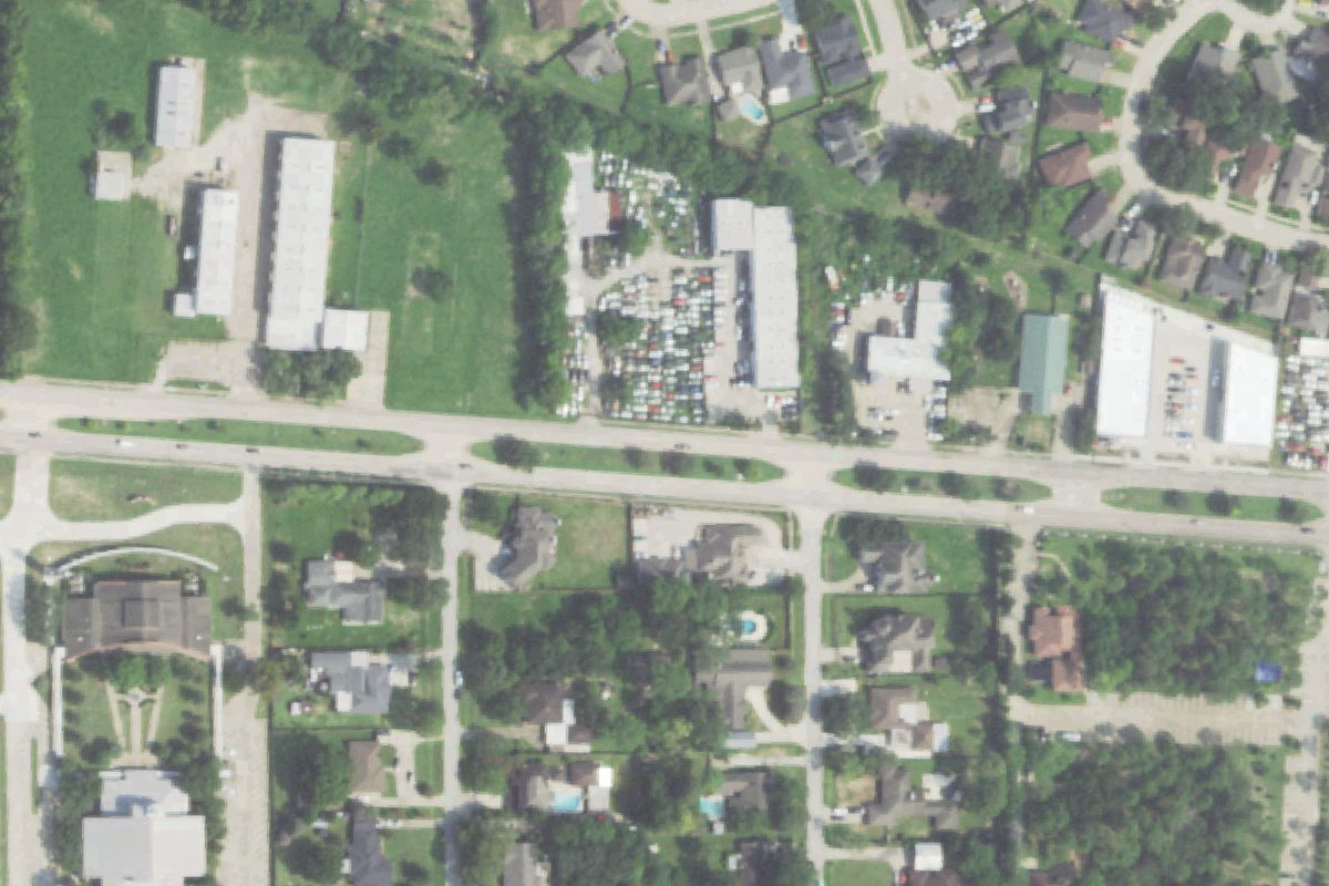 Aerial photo of Adam's Auto Sales & Parts at 12526 West Bellfort