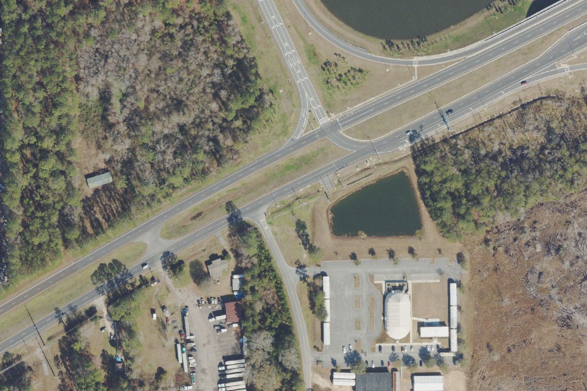 Aerial photo of Howell's Used Cars & Auto Parts at 12223 Normandy Blvd