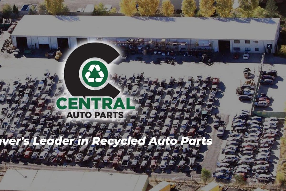Central Auto Parts: Aerial view of a salvage yard with rows of vehicles beside a long warehouse building